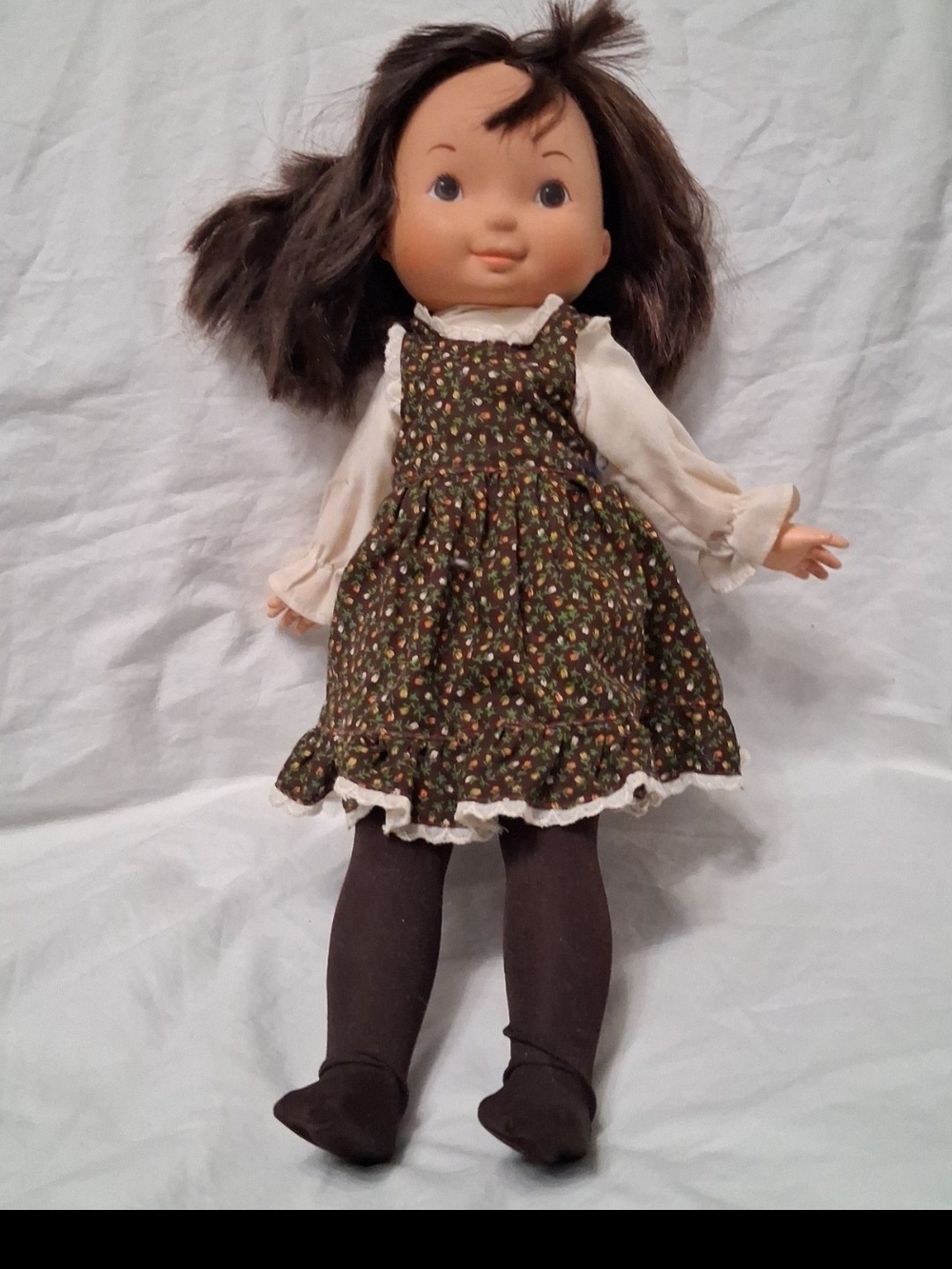 Fisher-Price Brown-Haired Girl Doll in Floral Dress